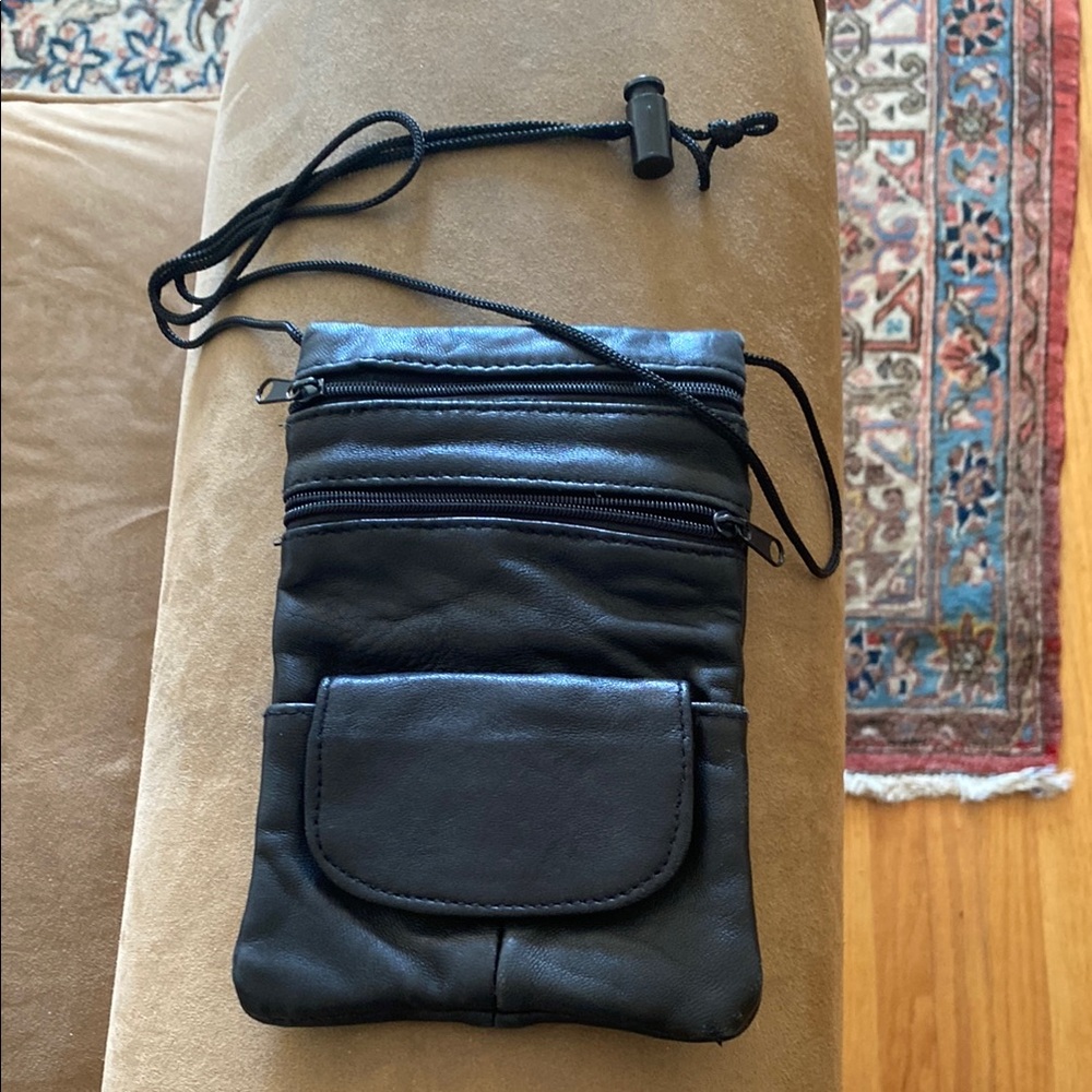 Sleek Black Belt Bag with Adjustable Strap and Minimalist Design